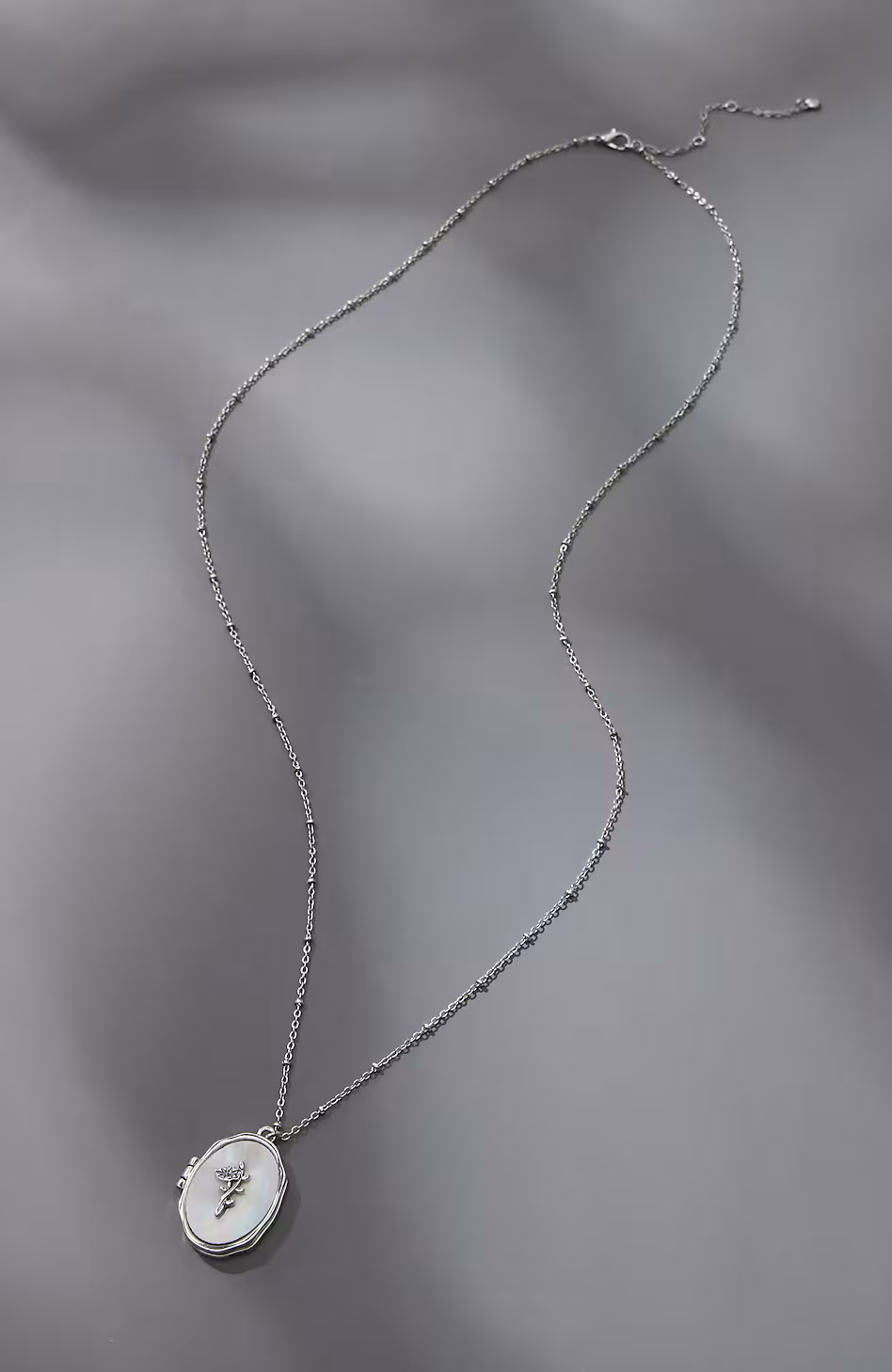 Compassion Fund Mother-Of-Pearl Locket