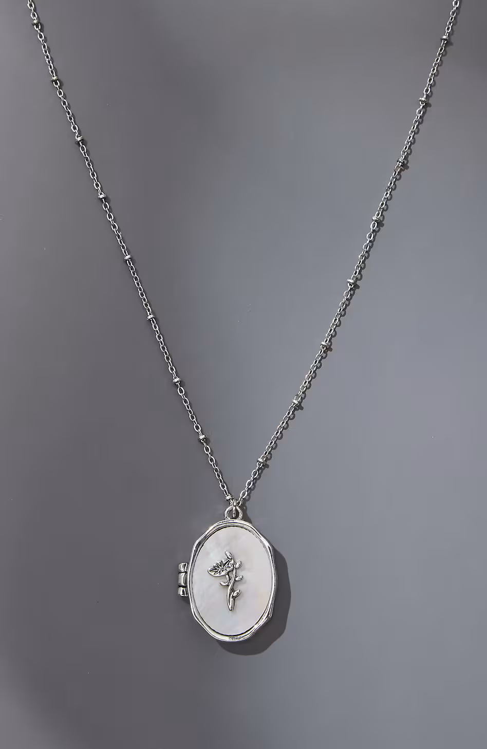 Compassion Fund Mother-Of-Pearl Locket
