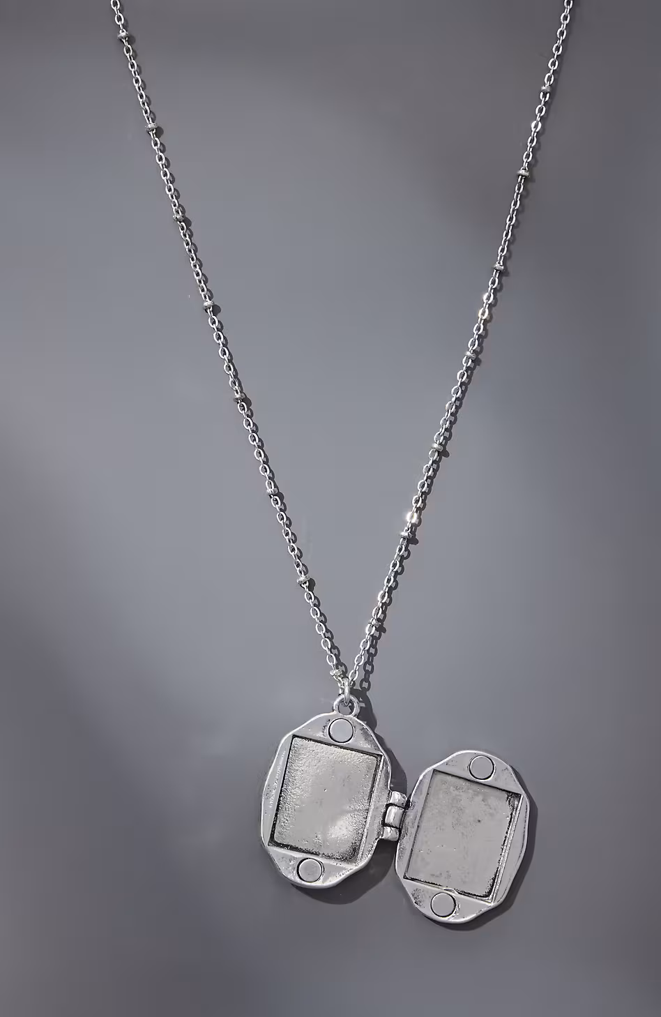 Compassion Fund Mother-Of-Pearl Locket